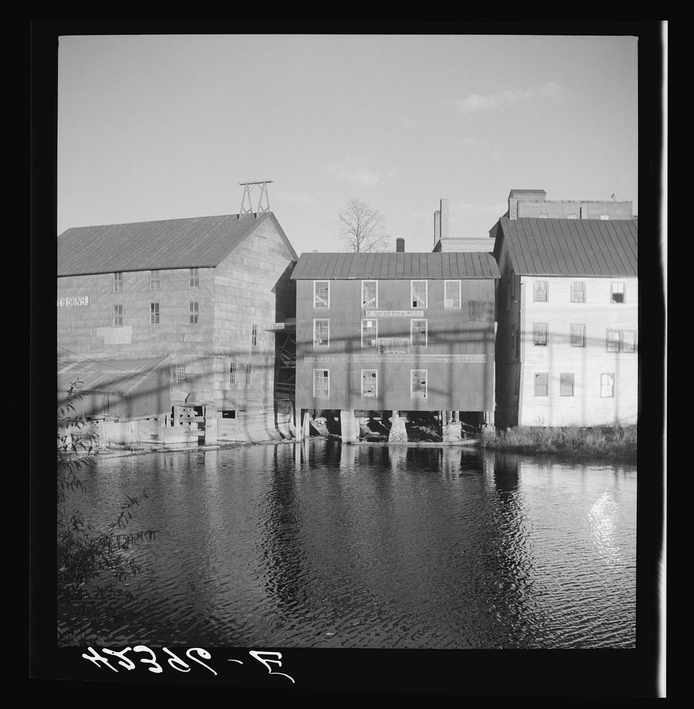 Houses along the river in Houlton, Maine. Sourced from the Library of Congress.