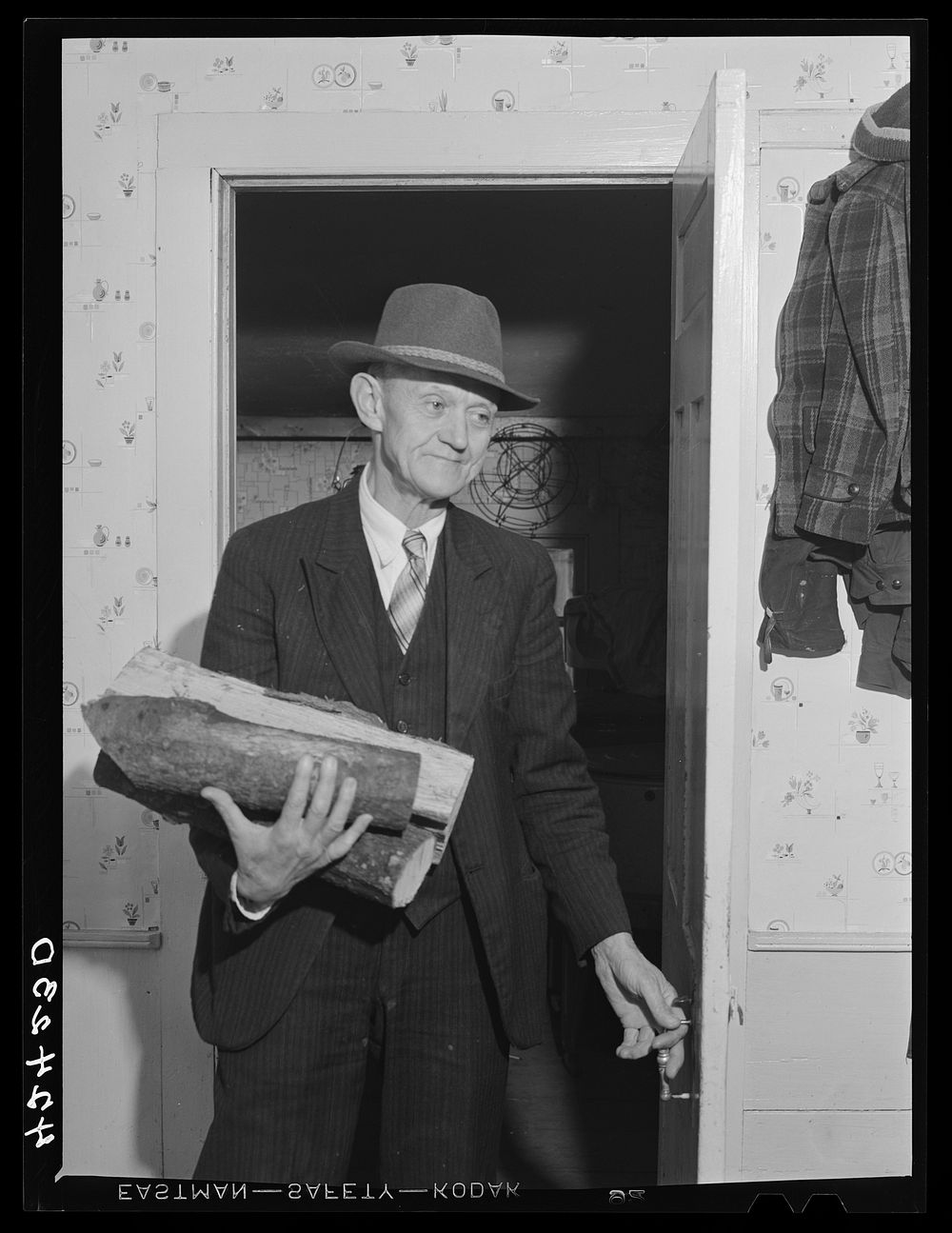 Mr. Timothy Levy Crouch, a Rogerine Quaker of Ledyard, Connecticut, bringing firewood for the Thanksgiving Day dinner.…