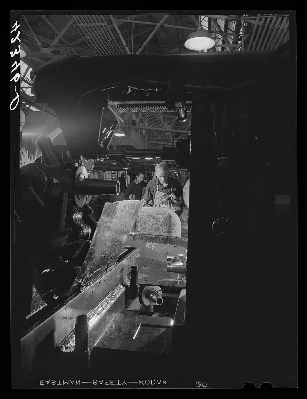 General view of grinding and polishing operations on propeller parts at the Hamilton Standard Propeller Corporation. East…