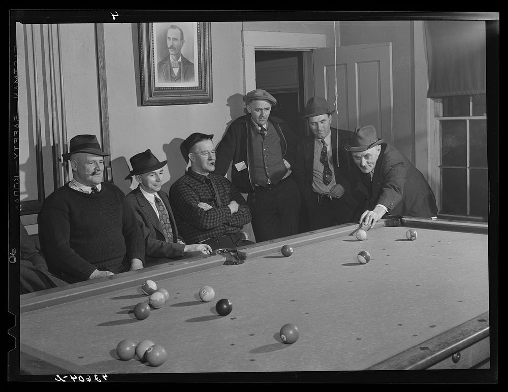 Poolroom at the Senator Baxter, a hotel, recreation hall, poolroom, etc. near shipyard in Bath, Maine. Sourced from the…