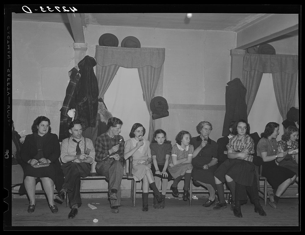 Sitting one out at a Saturday night square dance in Clayville, Rhode Island. Sourced from the Library of Congress.