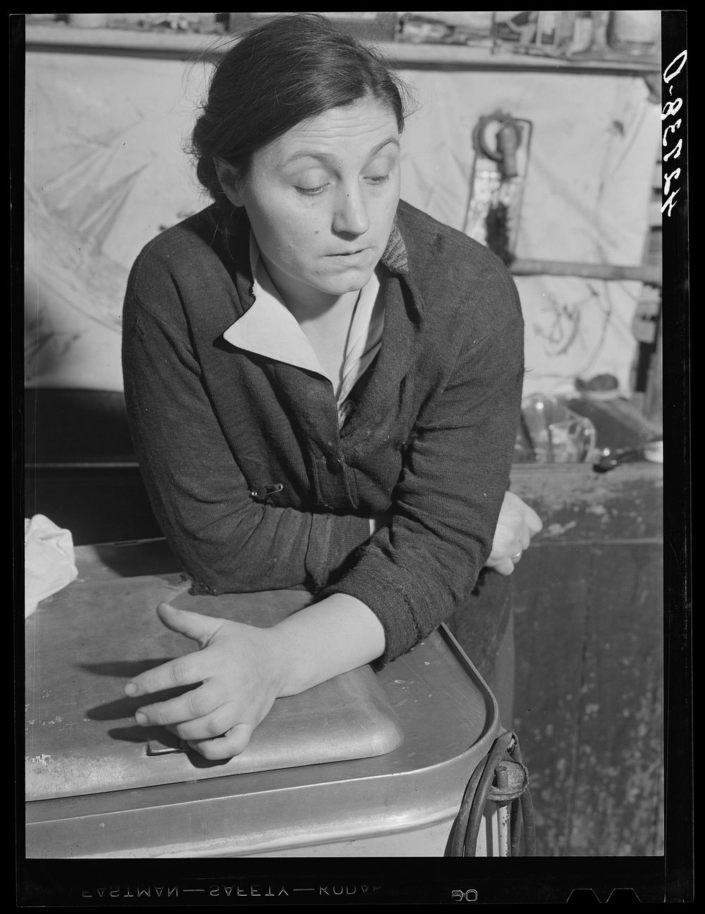 Wife of a Portuguese farmer who works part-time at a Naval base. Near Tiverton, Rhode Island. Sourced from the Library of…