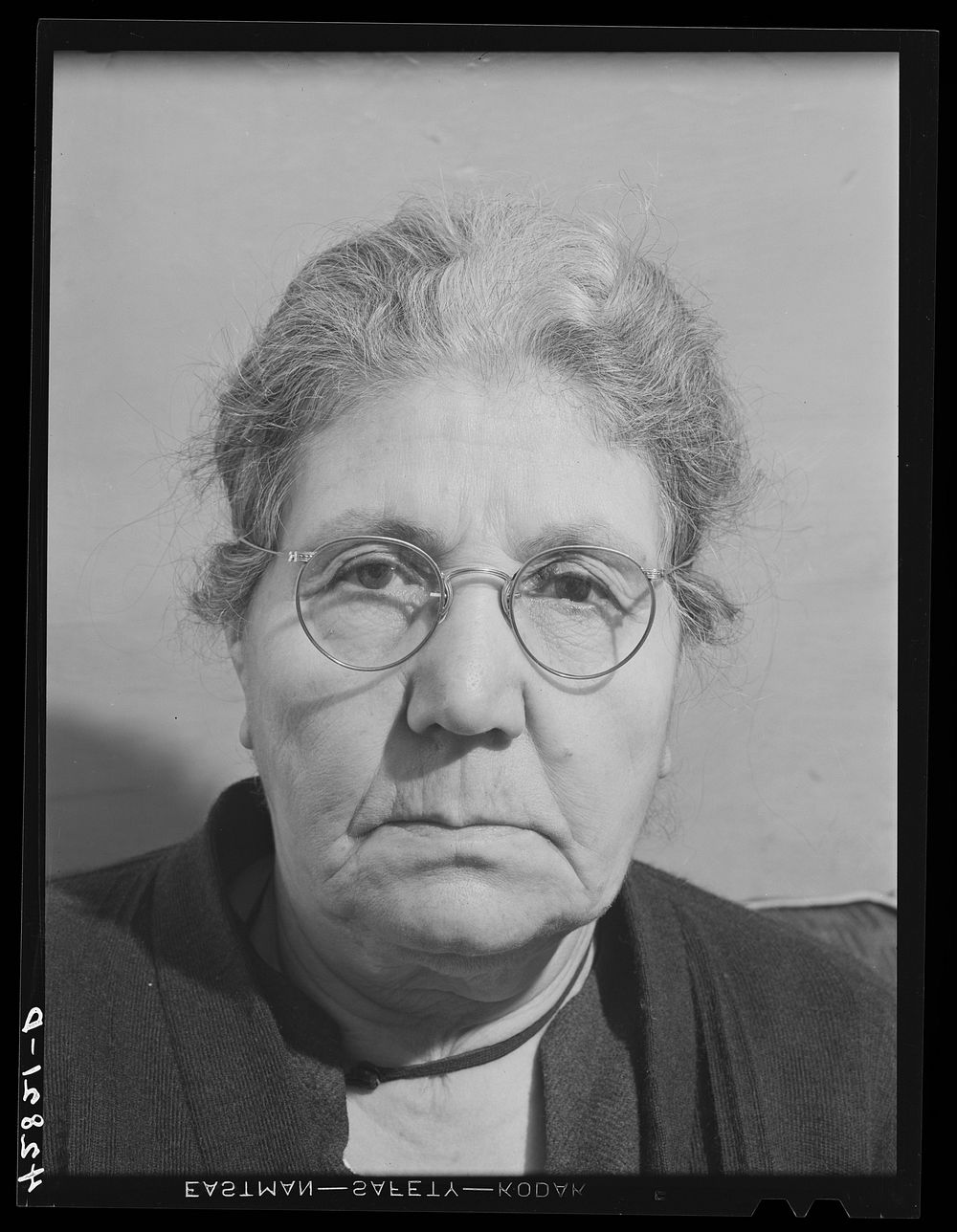 Mrs. Melkon Loosigian, Armenian, wife of vegetable farmer in West Andover, Massachusetts. They have a fourteen-acre farm and…