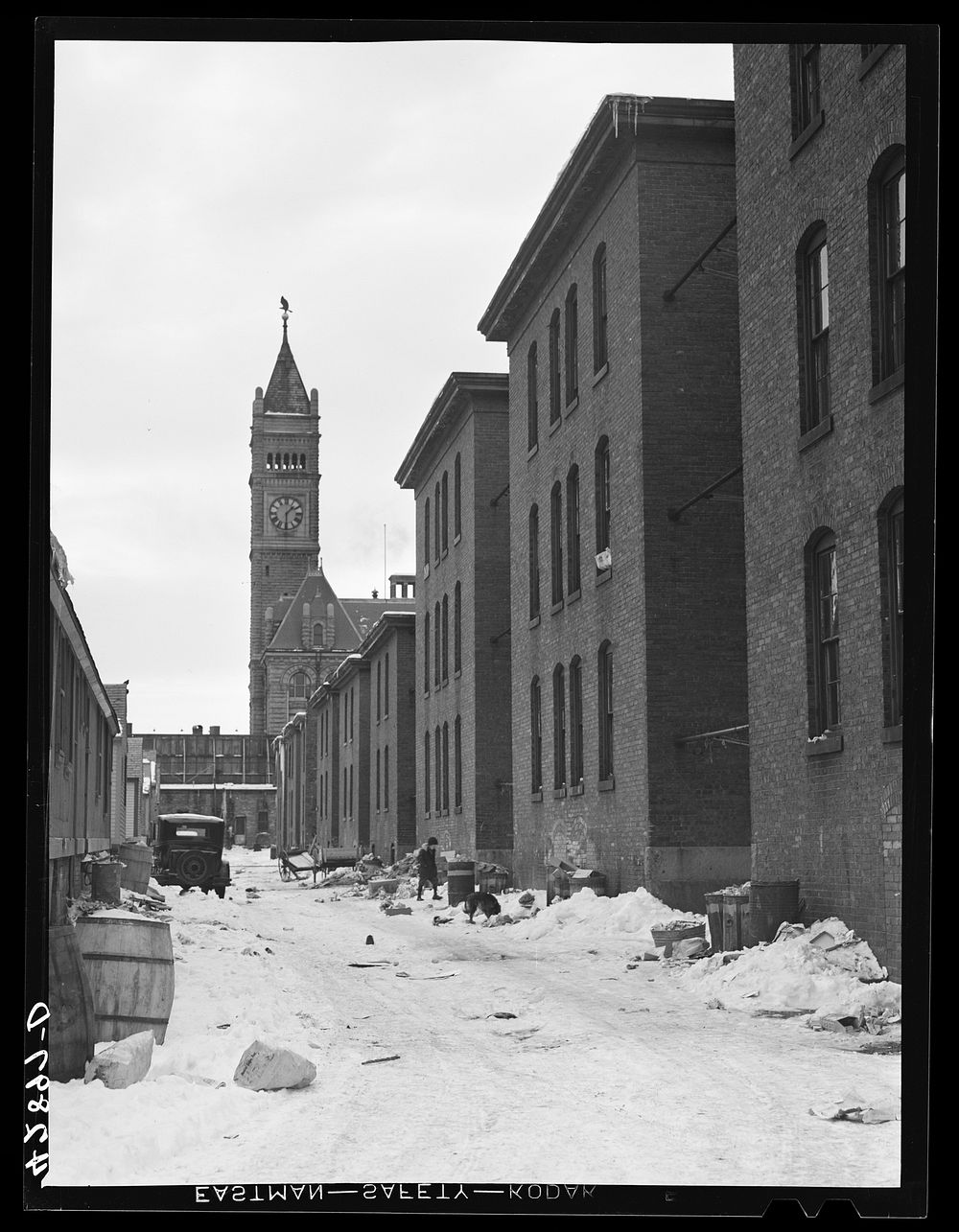 Row of workers' houses near the mills in Lowell, Massachusetts. Sourced from the Library of Congress.