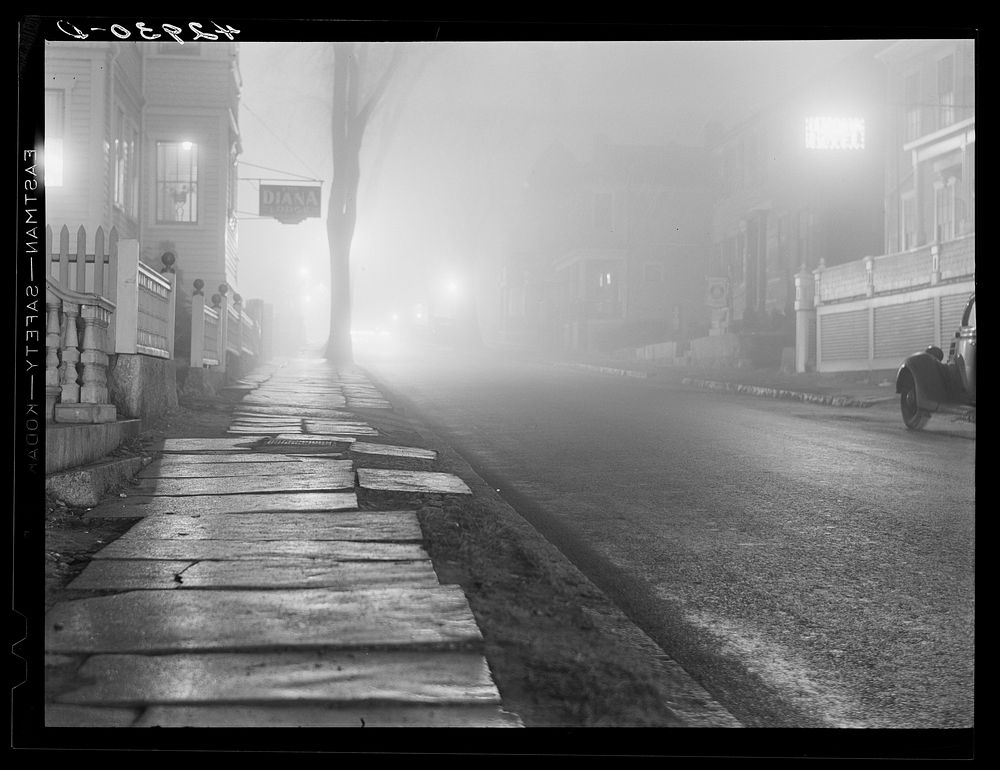 Street in New Bedford at night during a fog. New Bedford, Massachusetts. Sourced from the Library of Congress.
