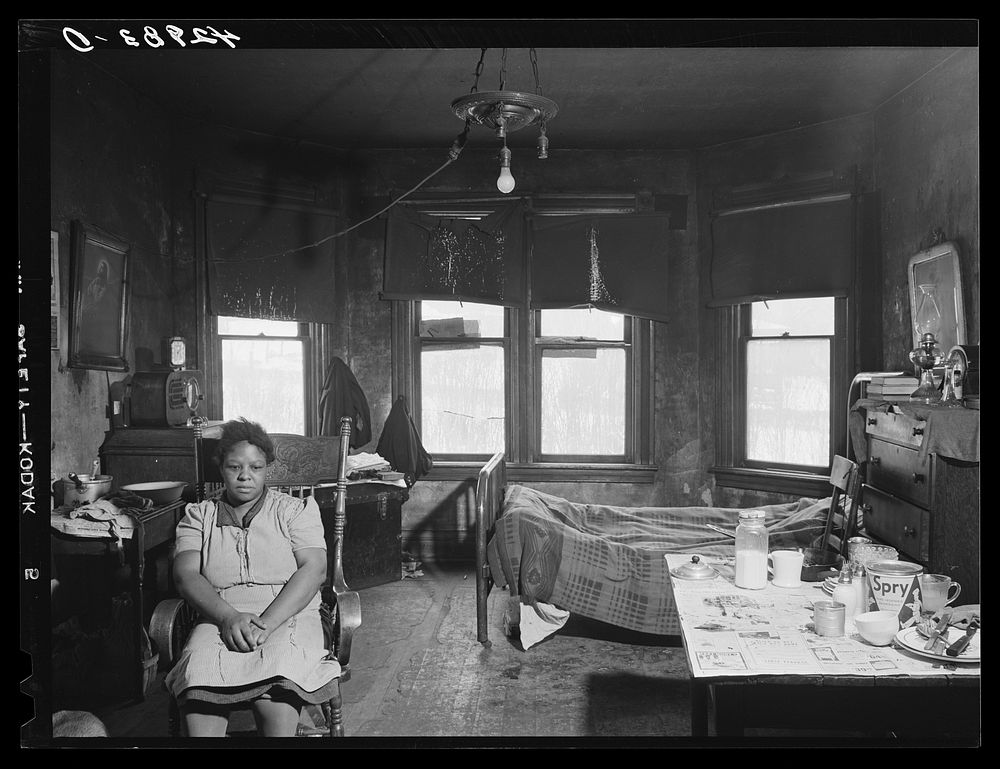  woman living with her family in a dilapidated house in the Mount Washington district of Beaver Falls, Pennsylvania. Sourced…