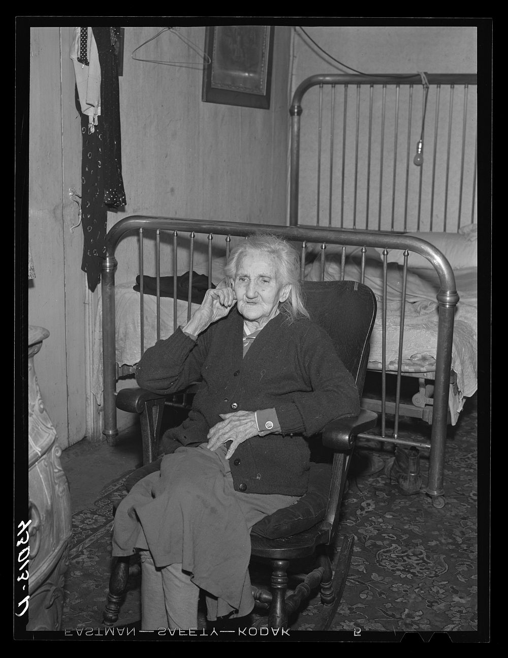 Old woman living in slum house in Bridgewater, Pennsylvania. Sourced from the Library of Congress.