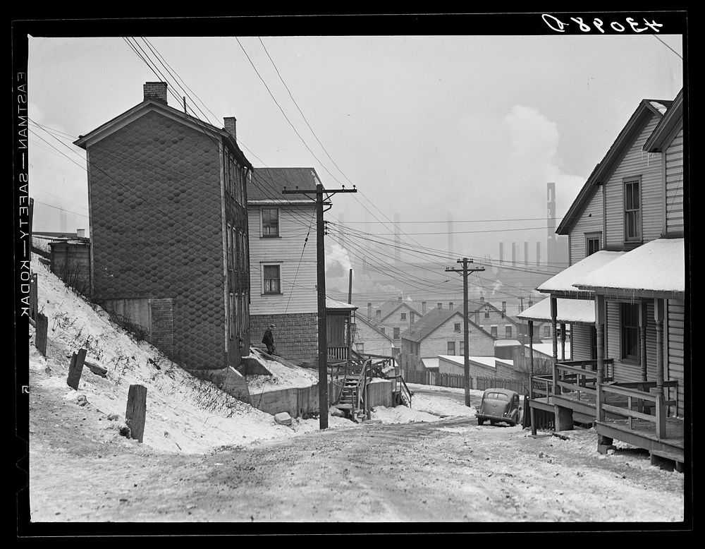 Street in Aliquippa, Pennsylvania with the Jones and Laughlin Steel Corporation in the background. Sourced from the Library…