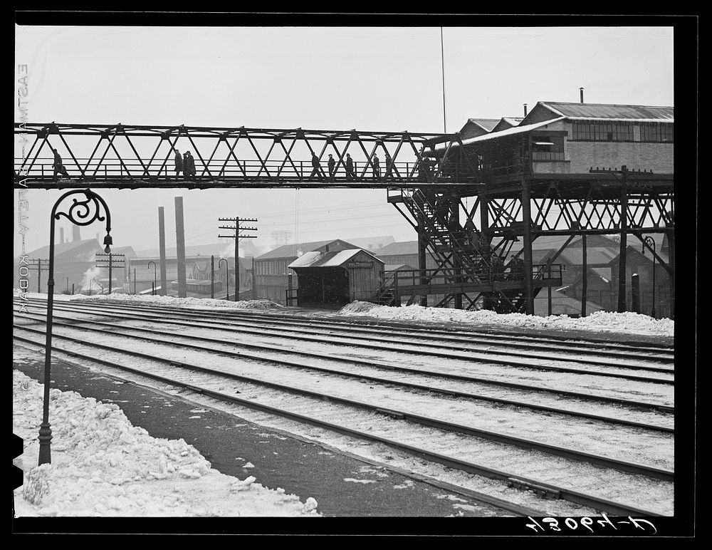 The end of the afternoon shift at the Jones and Laighlin Steel Corporation. Aliquippa, Pennsylvania. Sourced from the…