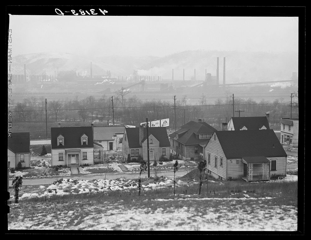 [Untitled photo, possibly related to: Houses in Baden, Pennsylvania. In the background is the Jones and Laughlin Steel Plant…
