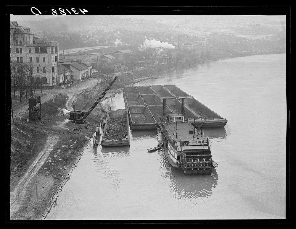 [Untitled photo, possibly related to: Coal barges along Ohio River at Rochester, Pennsylvania]. Sourced from the Library of…