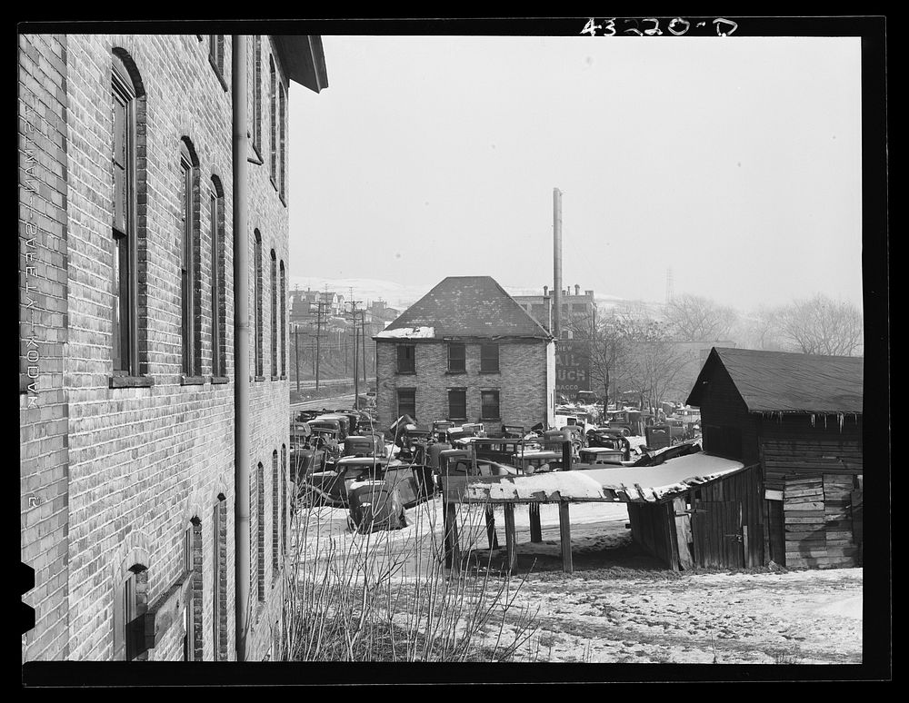 [Untitled photo, possibly related to: Auto graveyard next to abandoned stove works (right) in Rochester, Pennsylvania].…