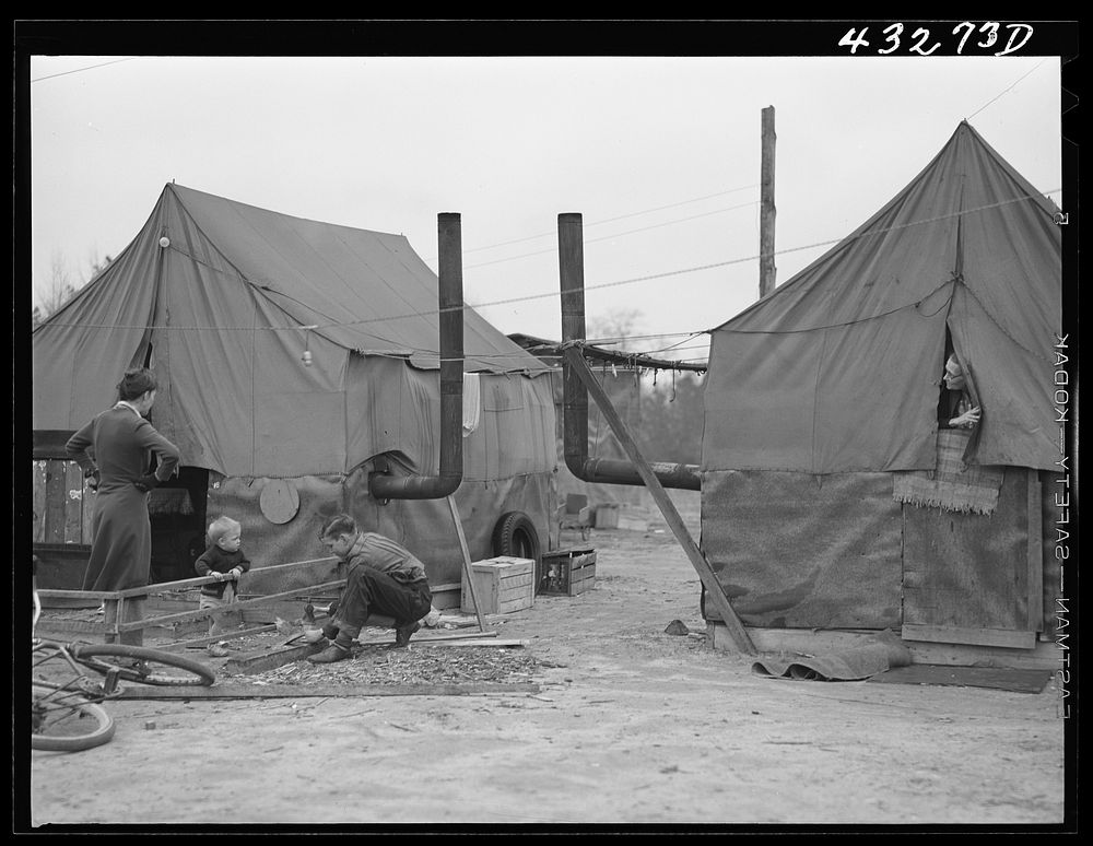 Tent of migratory workers employed at Fort Bragg, North Carolina. These tents were part of a small settlement at Manchester…