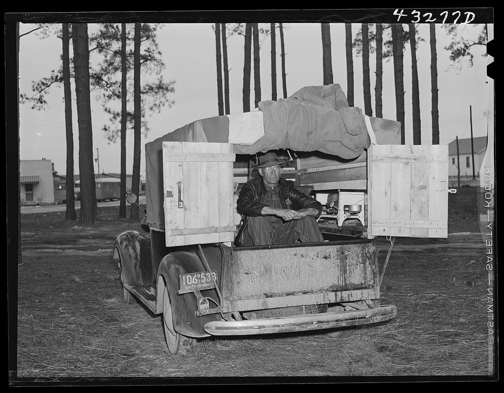 The rear end of this man's truck is his home. It includes a bed, small stove, and his personal belongings. An ex-leather…