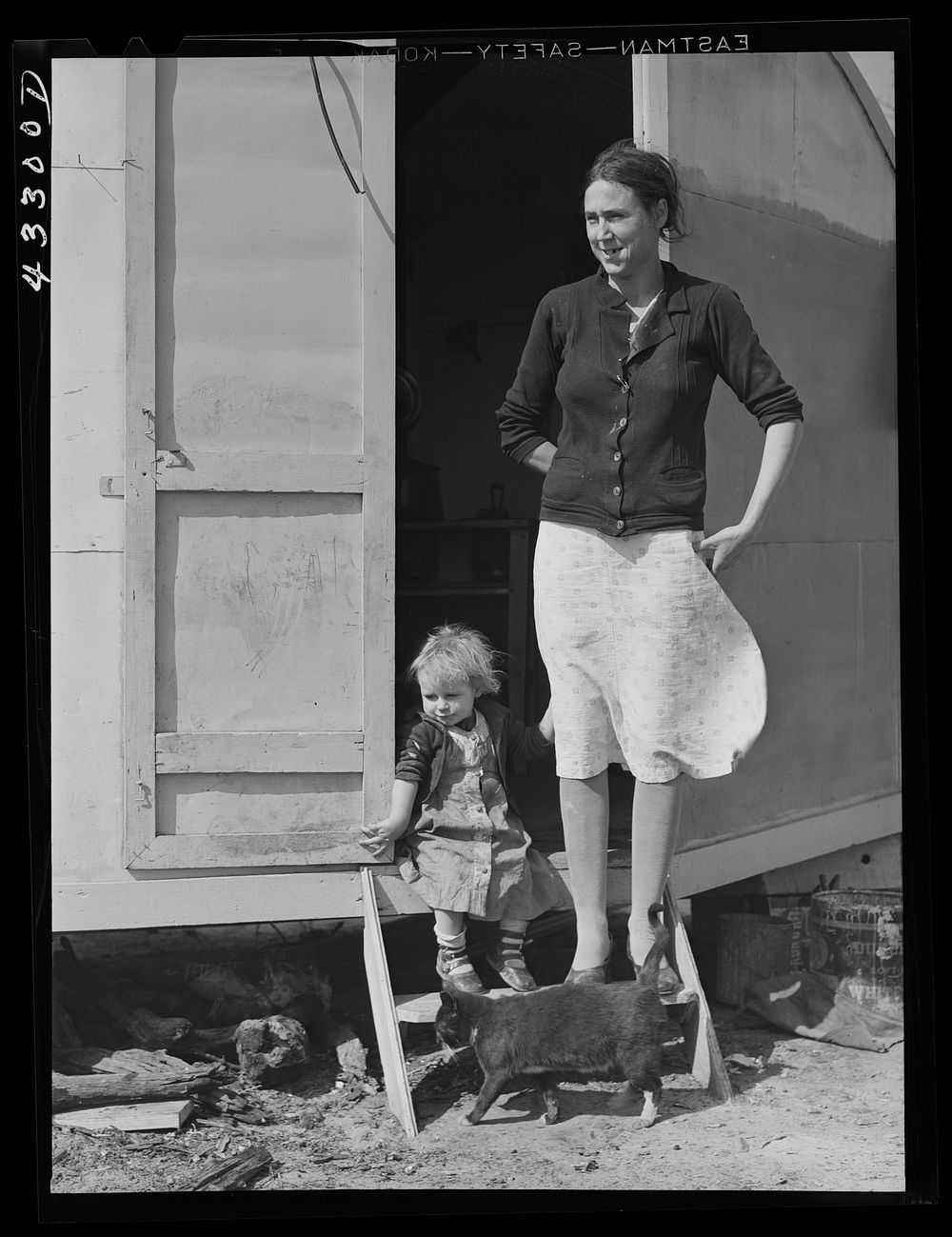 [Untitled photo, possibly related to: Her husband works at Fort Bragg, and expects to be laid off any day. They come from…