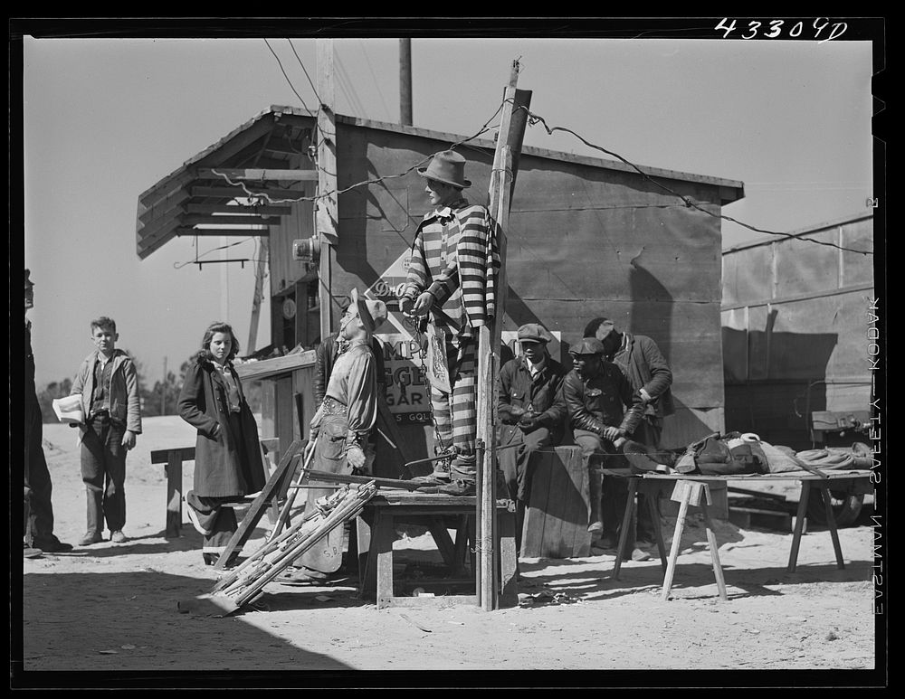 [Untitled photo, possibly related to: A traveling side-show. "Crime Museum," consisting of a dilapidated effigies of famous…