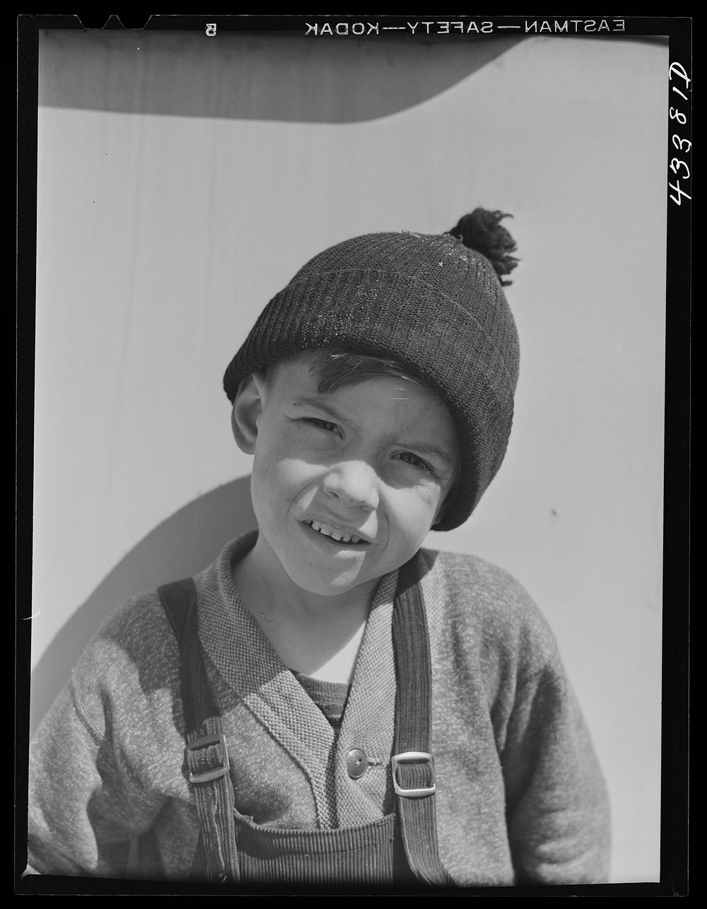 Child of a migratory construction worker living in a trailer settlement near Fort Bragg, North Carolina. Sourced from the…