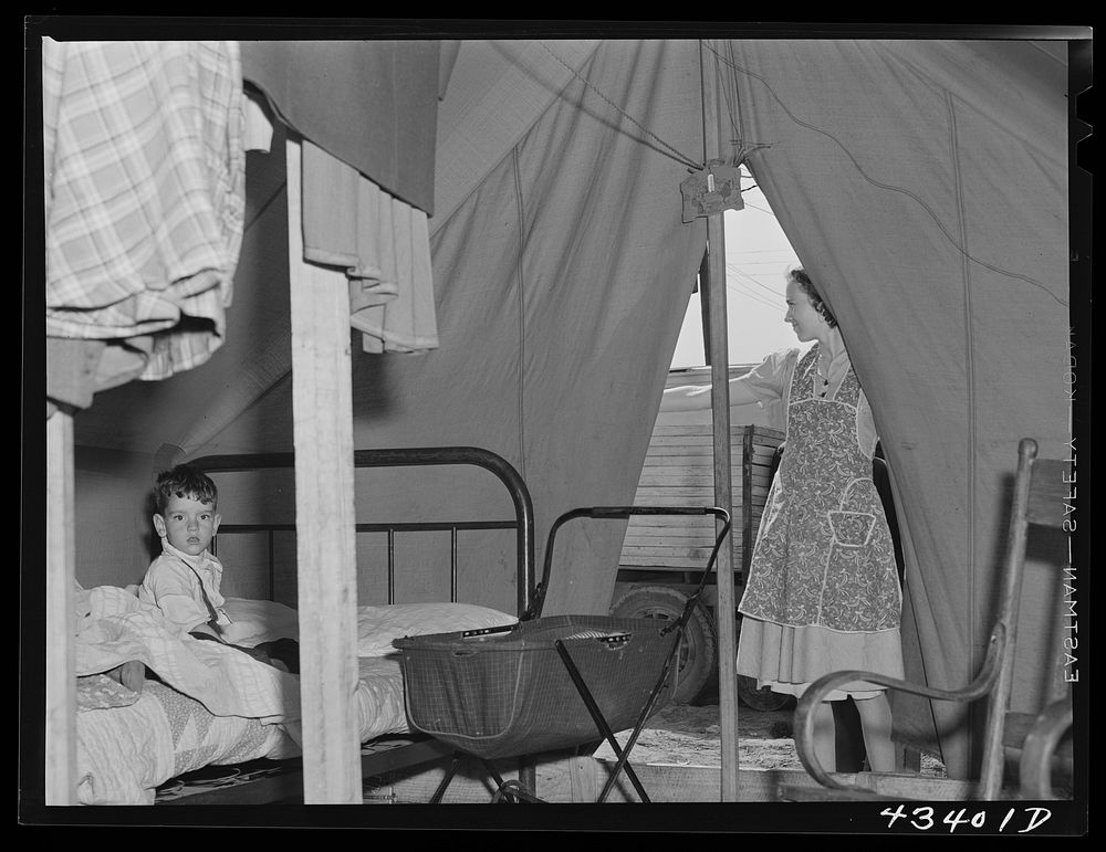 A family from the southern part of Texas occupies this tent. Husband works at Fort Bragg, but they expect to move on soon.…