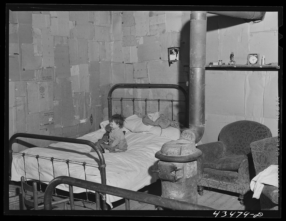 [Untitled photo, possibly related to: In the home of a "squatter" family that was preparing to move off the Camp Croft area.…