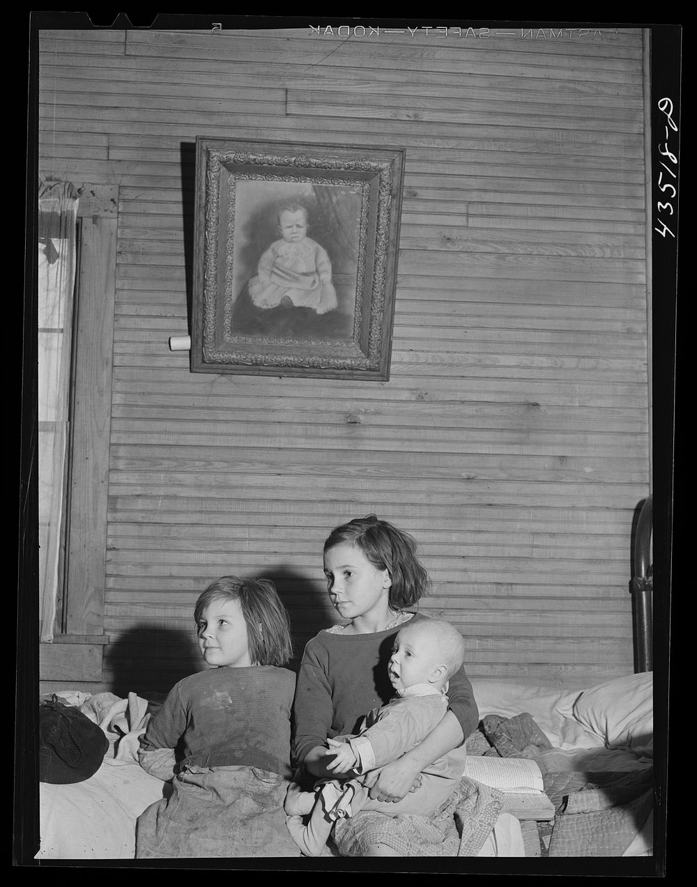 Children of a "squatter" family who were preparing to move out of the Camp Croft area. Near Spartanburg, South Carolina.…