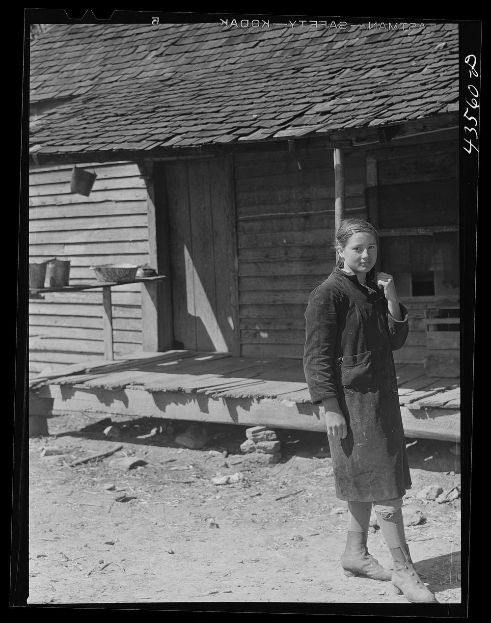 [Untitled photo, possibly related to: Children of a "squatter" family who were preparing to move out of the Spartanburg Army…