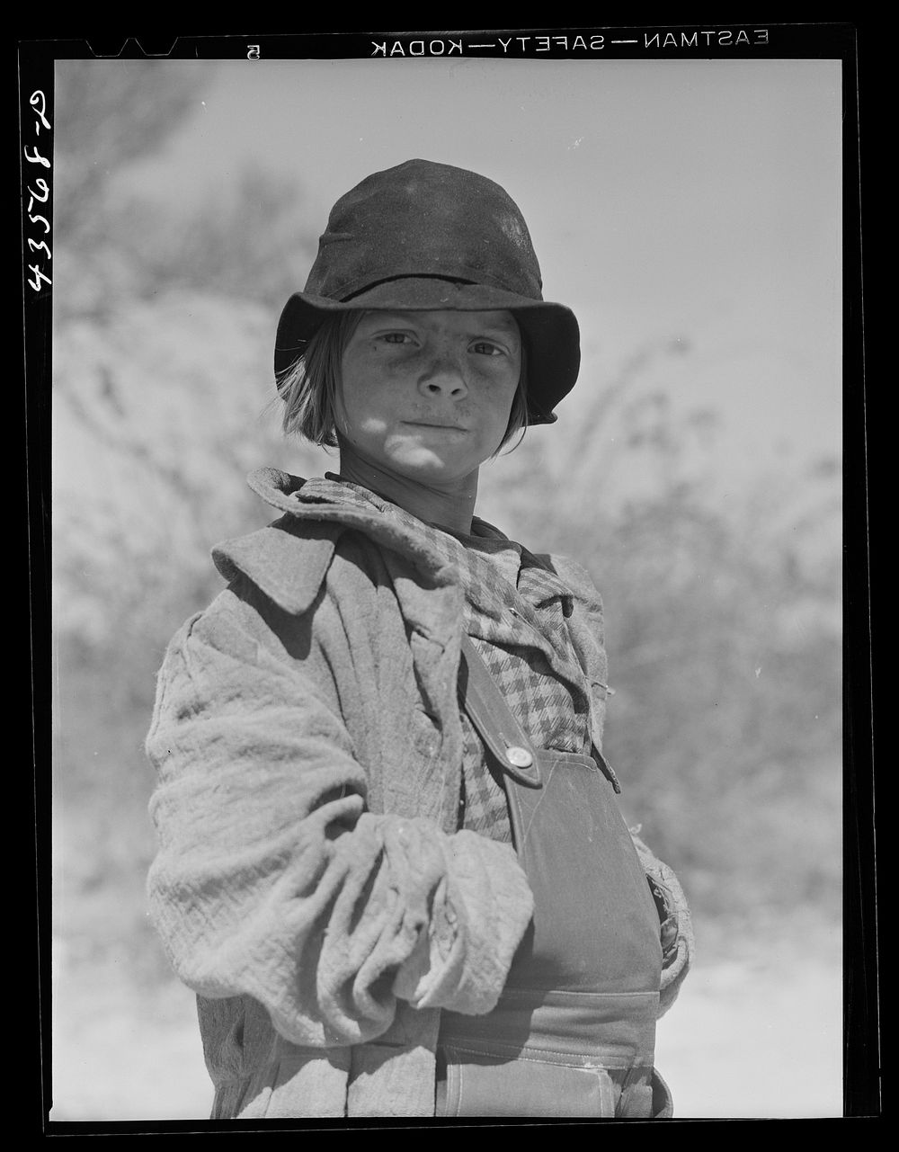 One of the children of a "squatter" family that had to move out of the Camp Croft area. Near Whitestone, South Carolina…