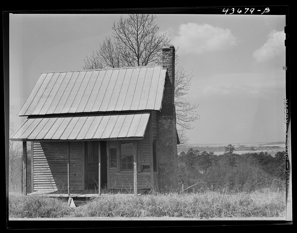 [Untitled photo, possibly related to: Abandoned farmhouse in the Camp Croft area. Near Whitestone, South Carolina region].…