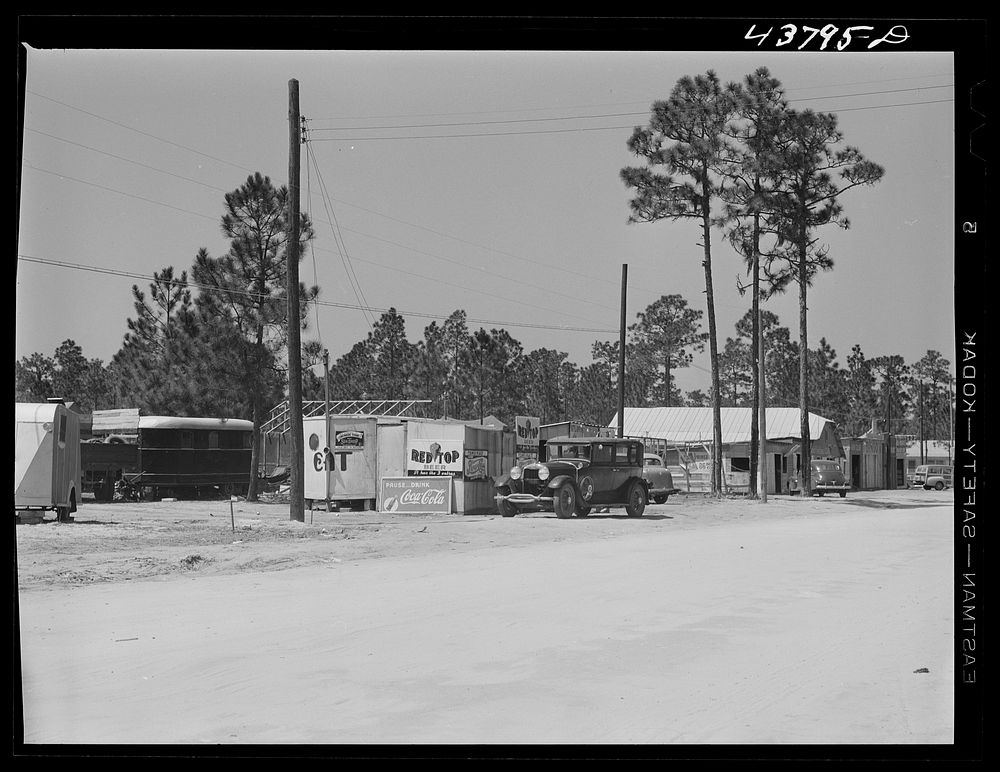 Amusement area growing up just outside the Camp Stewart grounds. Near Hinesville, Georgia. Sourced from the Library of…