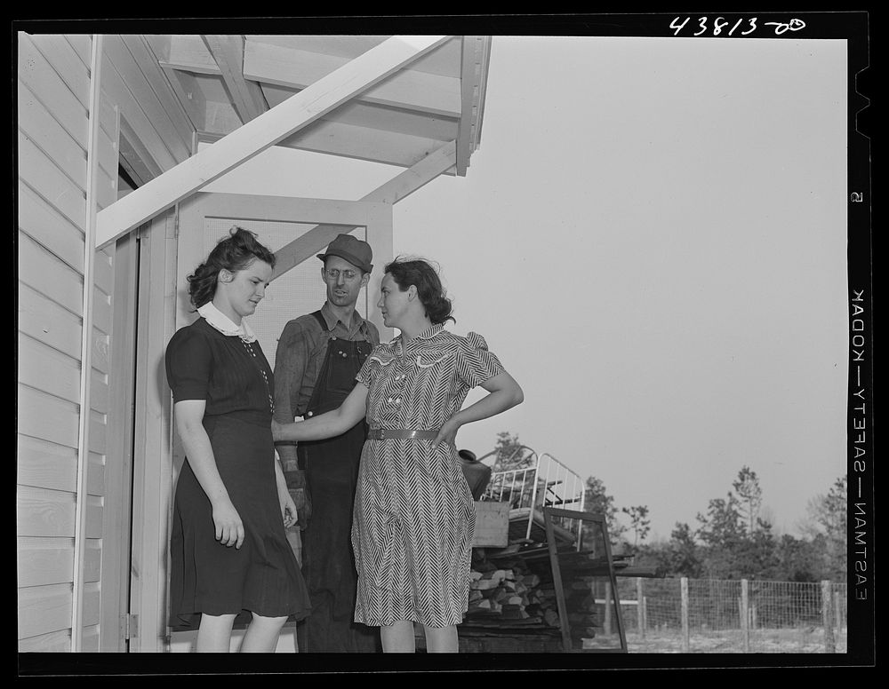 Mr. and Mrs. Paul Hatchet and a friend who has come to see their new prefabricated house at Pacolet, South Carolina. Sourced…