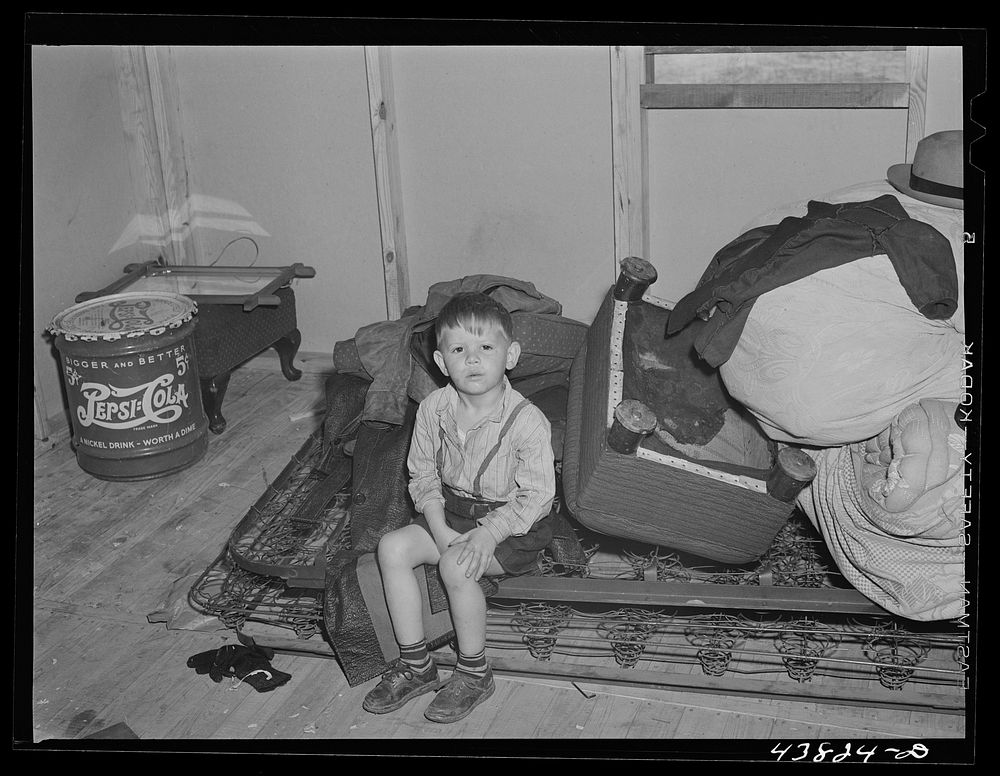 Little boy whose family has just moved into a new prefabricated house at Pacolet, South Carolina. Sourced from the Library…