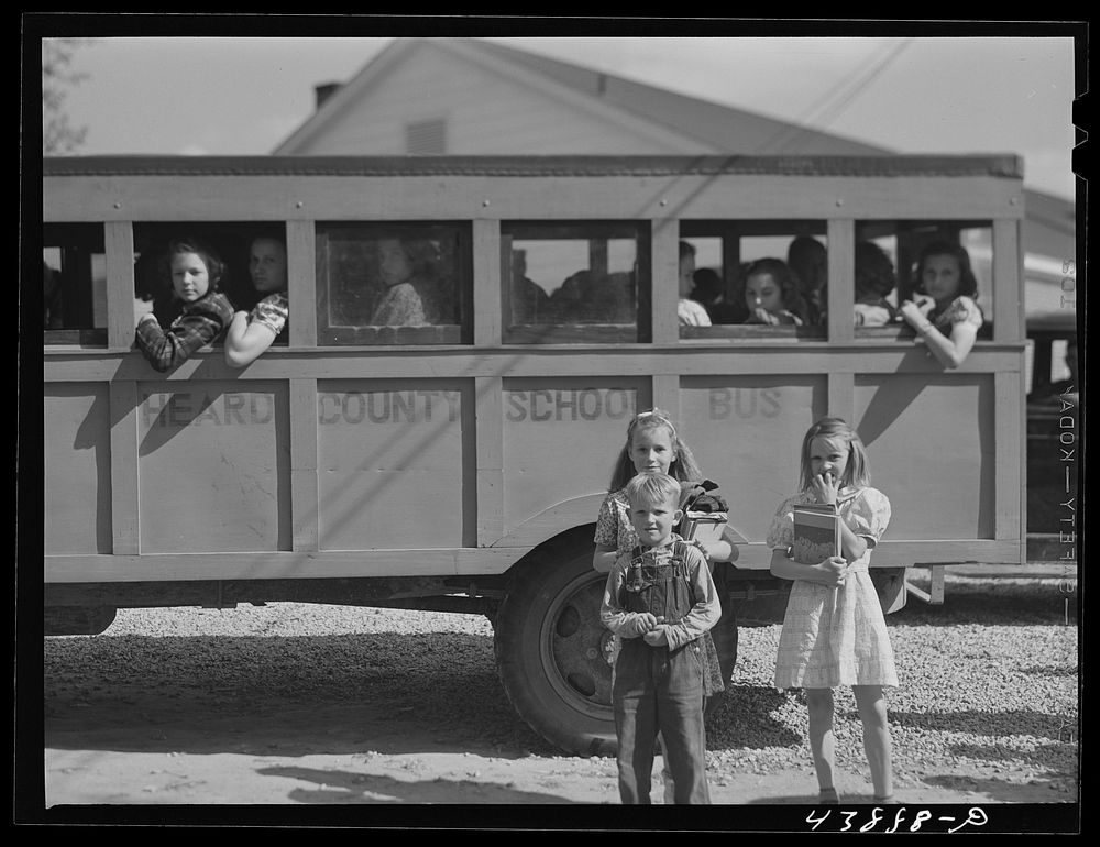 Schoolchildren and bus. Franklin, Heard County, Georgia. Sourced from the Library of Congress.