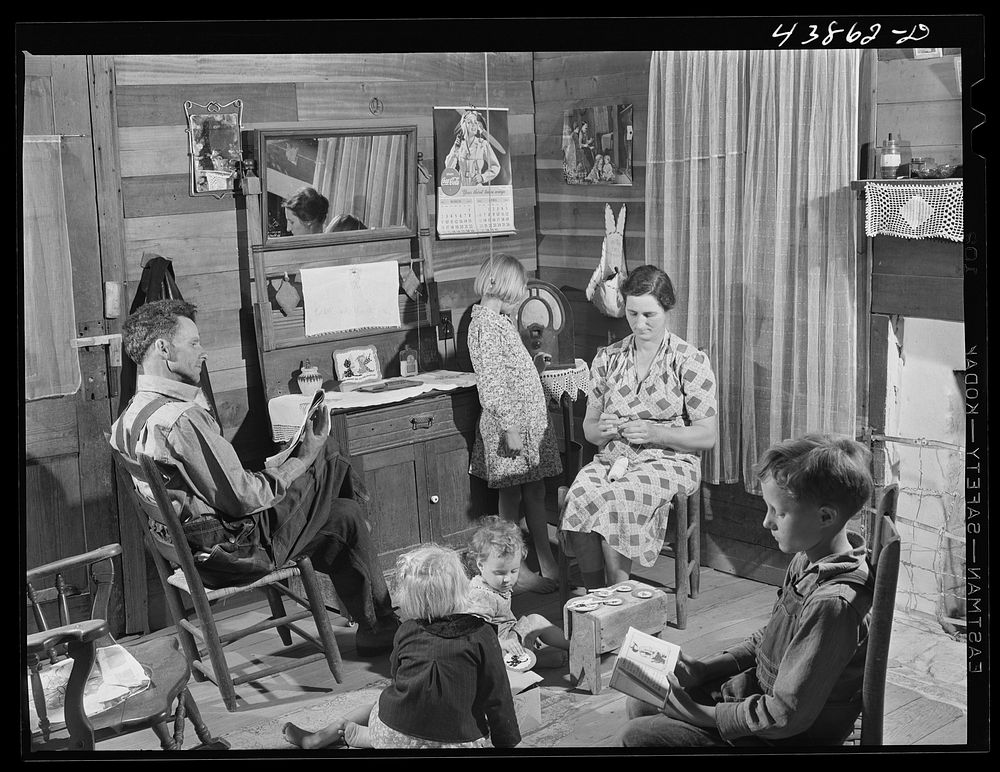Mr. and Mrs. L. Smith and their younger children in their home on their farm, Carroll County, Ga.. Sourced from the Library…