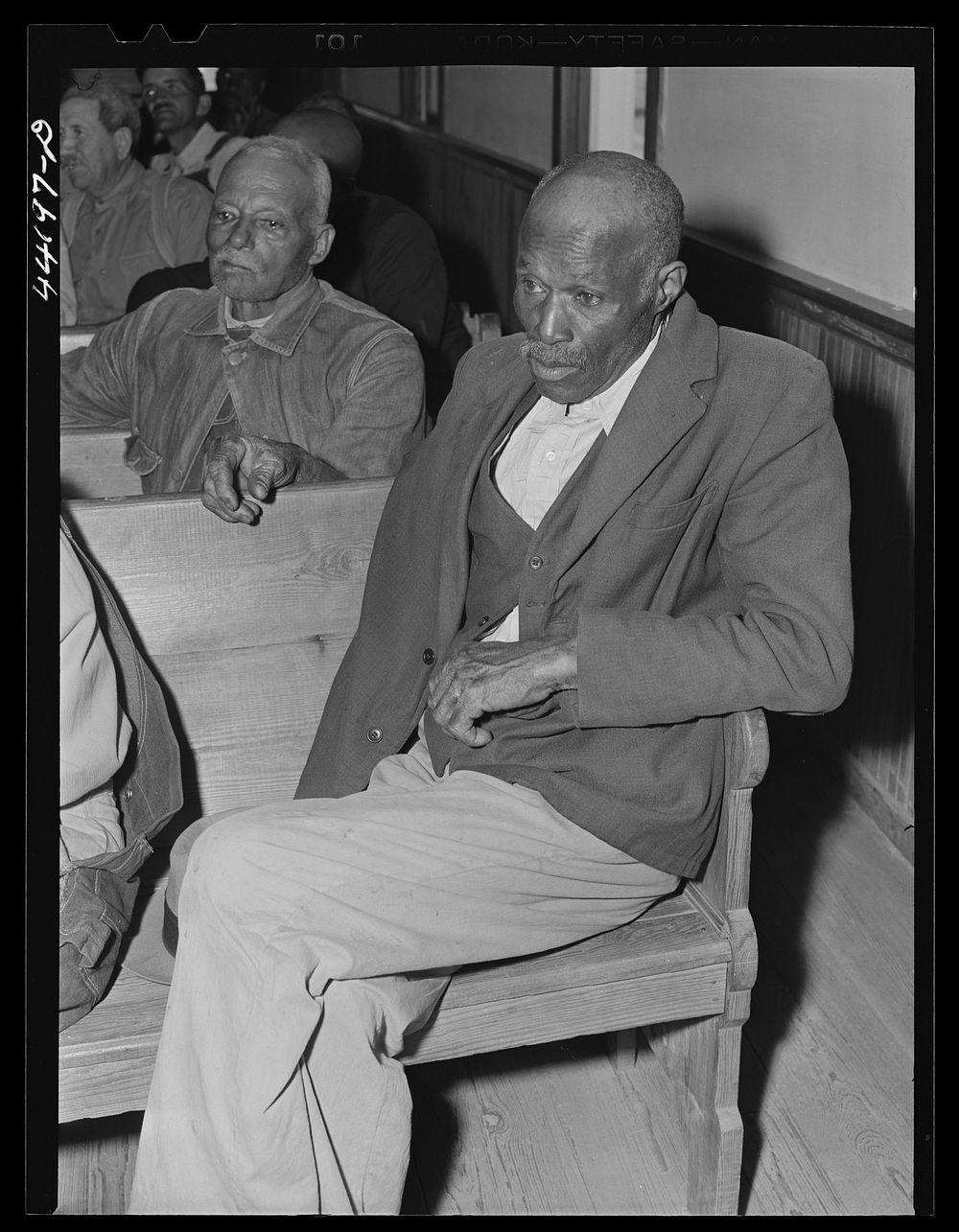 At a meeting of  FSA (Farm Security Administration) borrowers in a church near Woodville. Greene County, Georgia. Sourced…