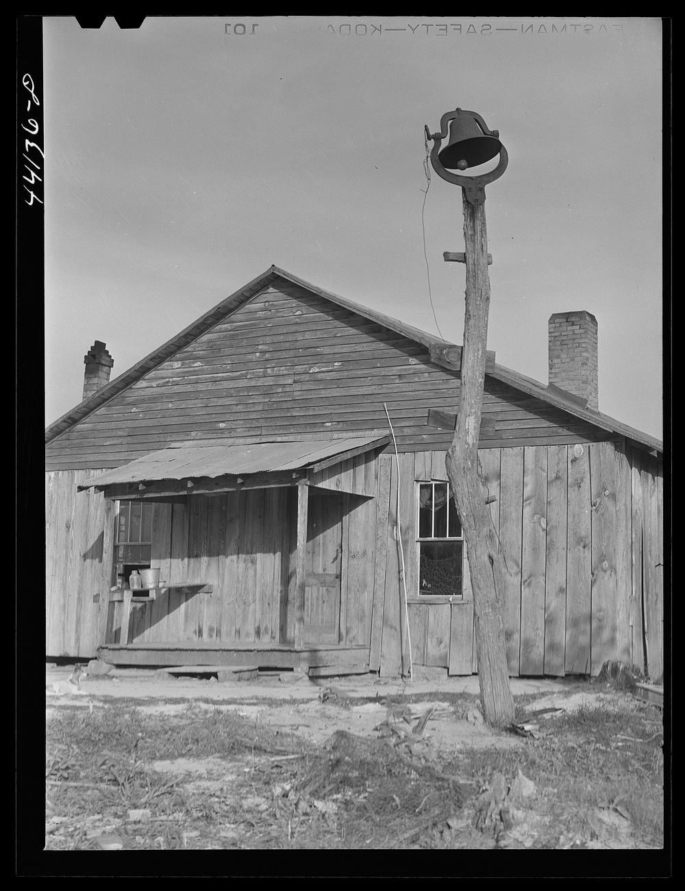 Tenant house and plantation bell. Heard County, Georgia. Sourced from the Library of Congress.