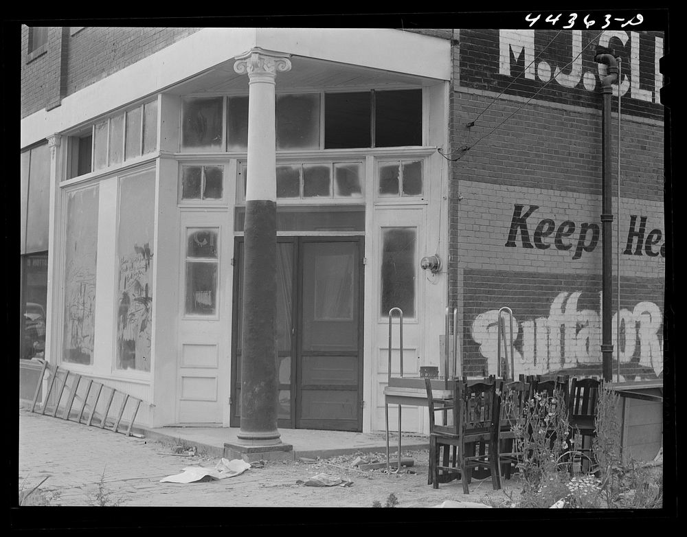 A new store being readied for opening on the main street of Childersburg, Alabama. Sourced from the Library of Congress.