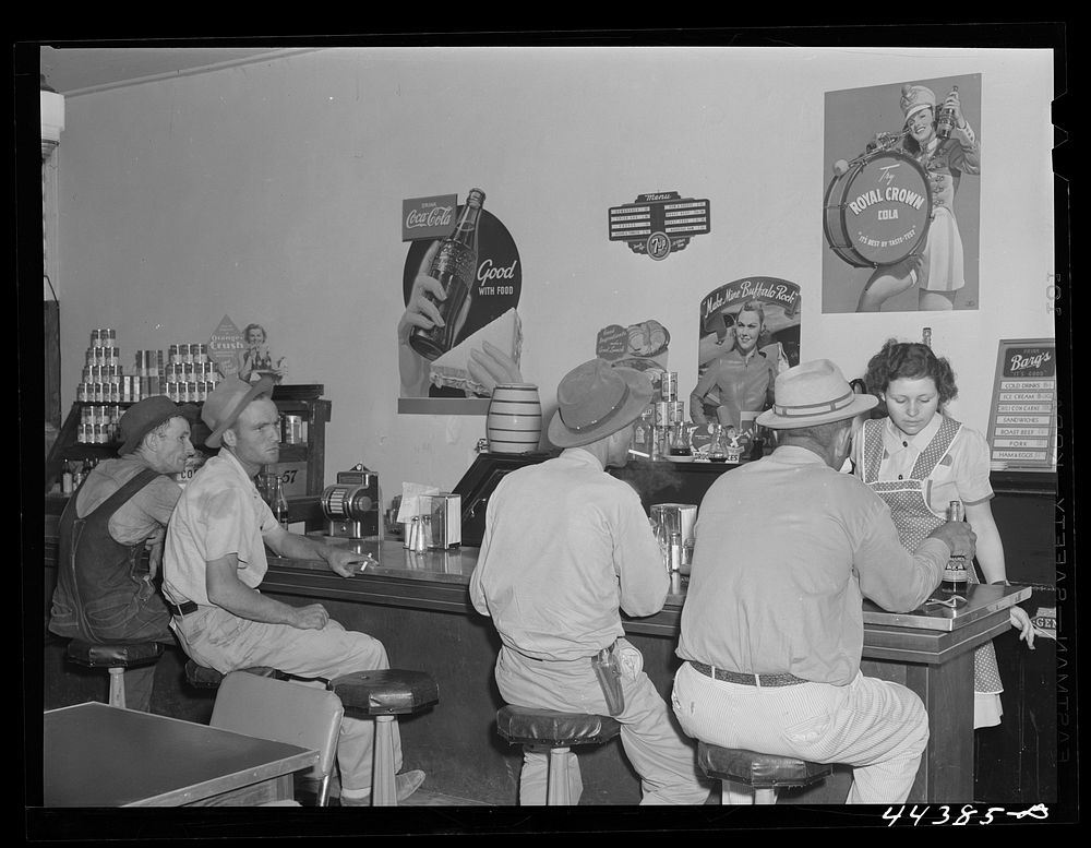 Workers from the nearby powder plant eating in one of the many new cafes in Childersburg, Alabama. Sourced from the Library…