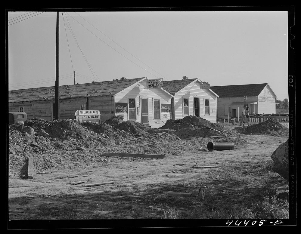 New cafes and bunkhouses amid the laying of a new sewer. Childersburg, Alabama. Sourced from the Library of Congress.