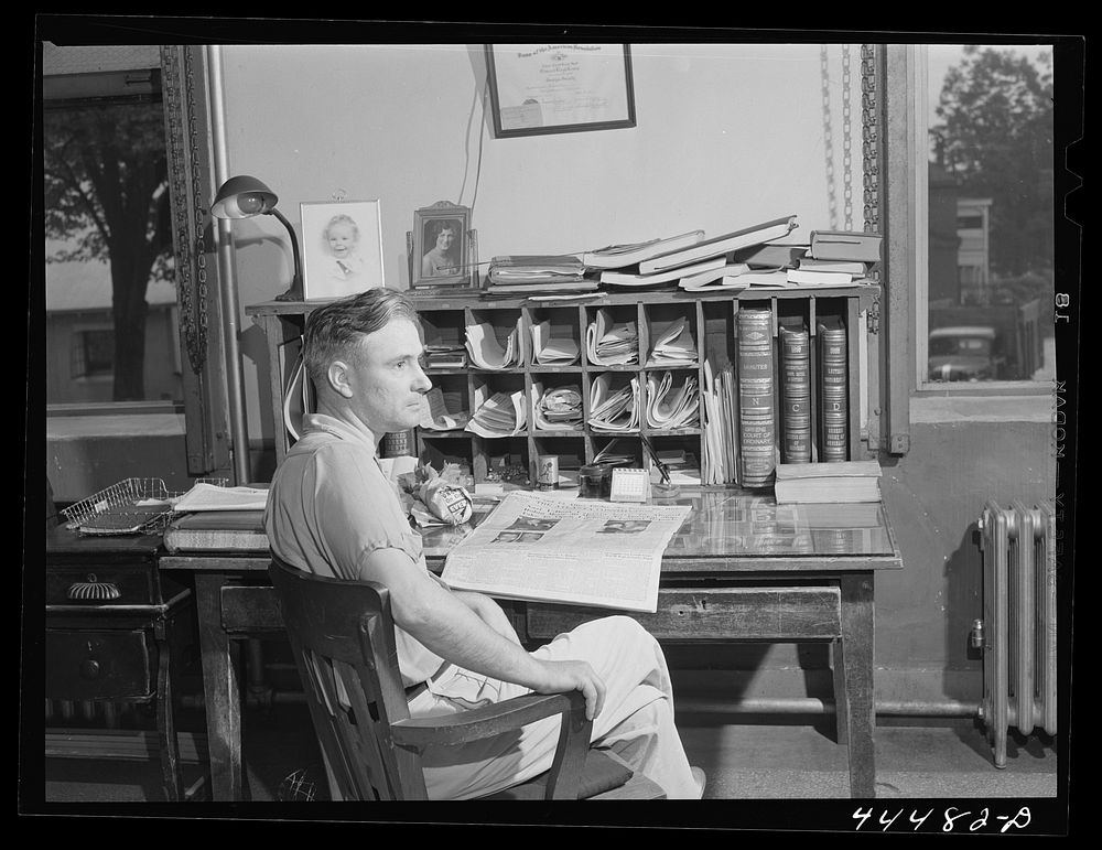 Mr. Lloyd Lewis, Greene County ordinary, in his office in Greensboro, Georgia. Sourced from the Library of Congress.