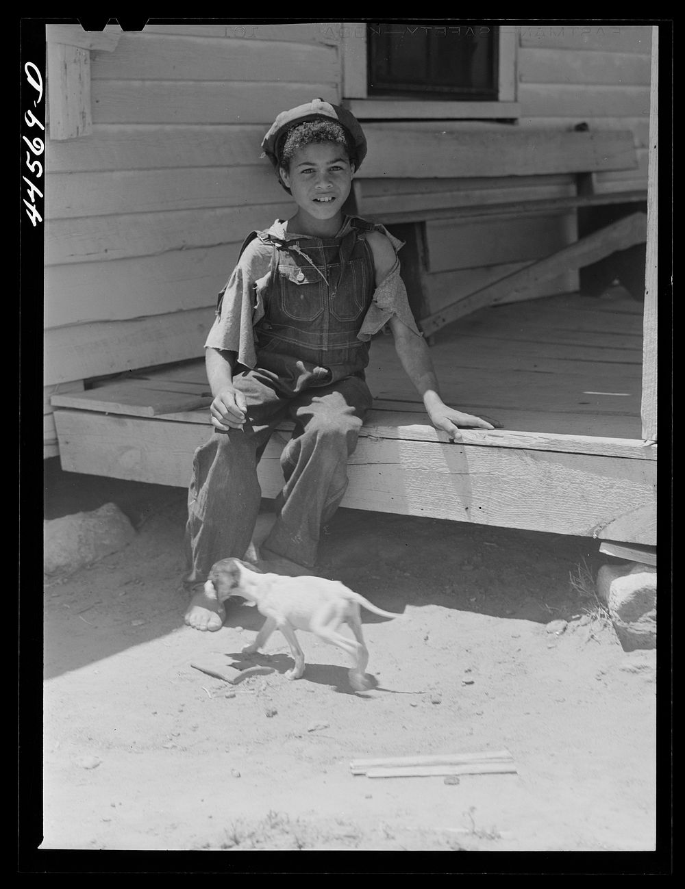 One of the children of R. J. Smith, FSA (Farm Security Administration) borrower. Woodville, Greene County, Georgia. Sourced…
