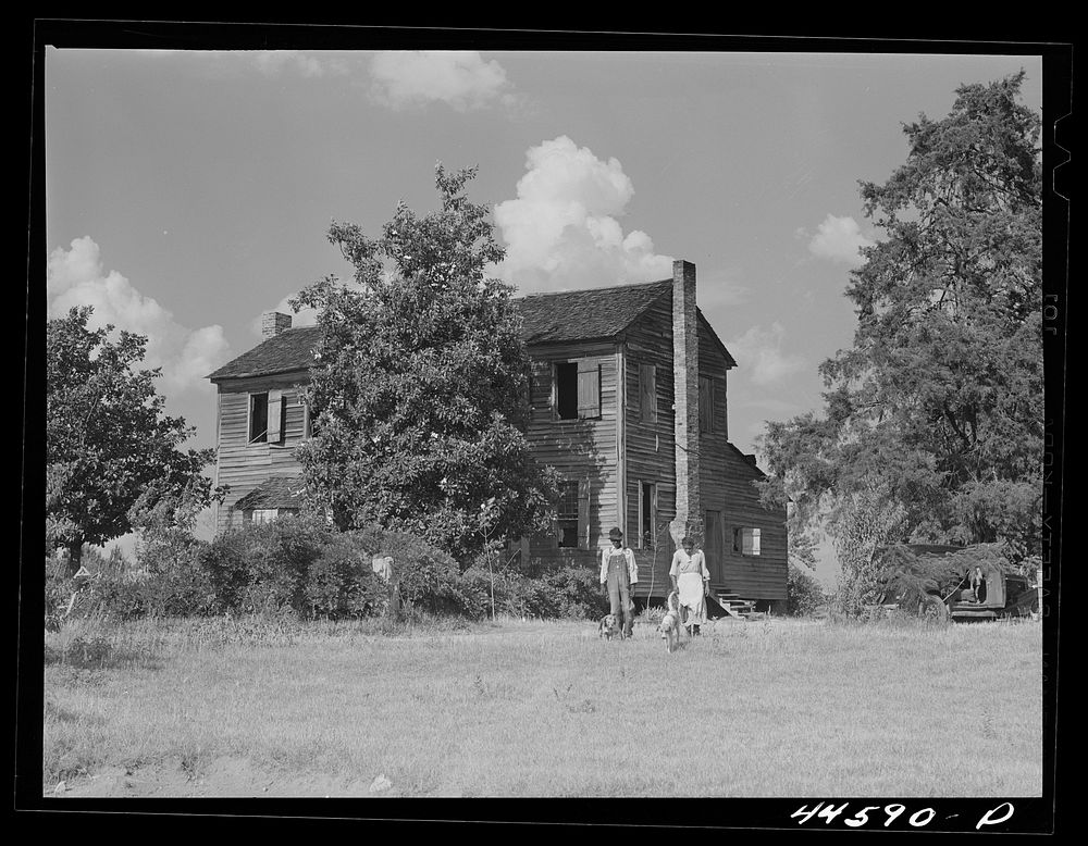 The old Armour plantation home now occupied by a  tenant family. Greene County, Georgia. Sourced from the Library of…
