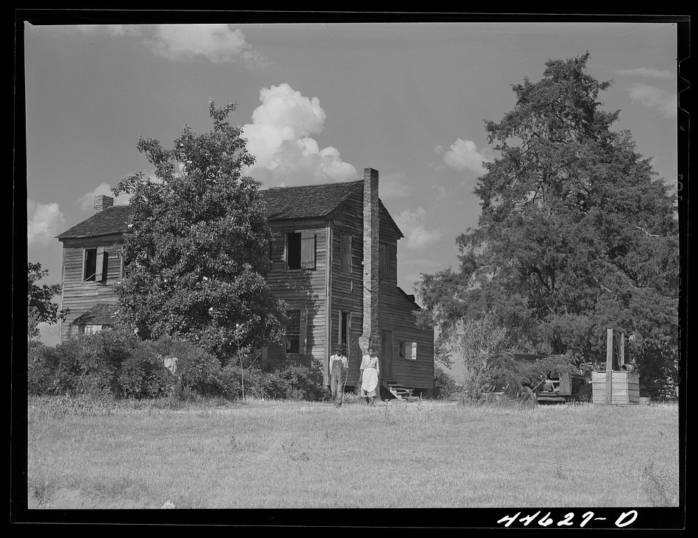 [Untitled photo, possibly related to: The old Armour plantation home now occupied by a  tenant family. Greene County…