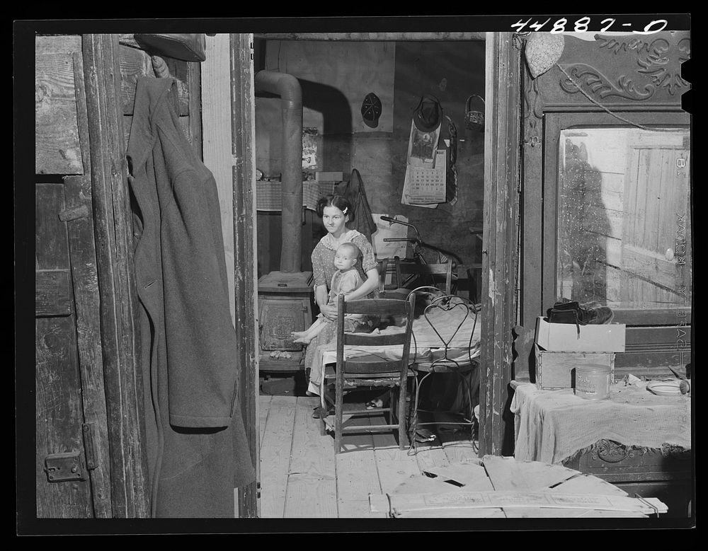 Woman and her child who must move out. The Army is taking over the area for maneuver grounds. Caroline County, Virginia.…