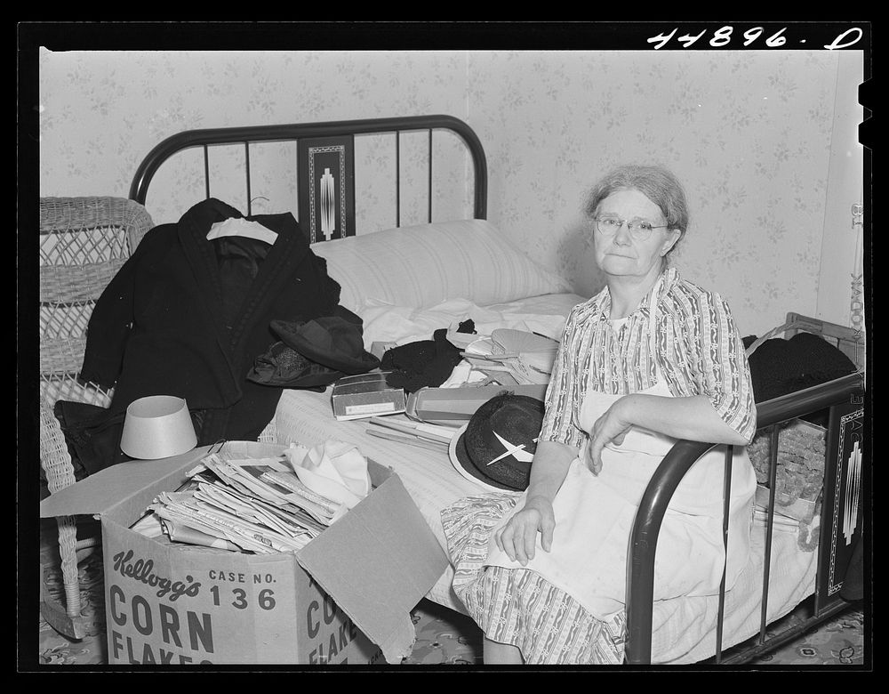This woman is packing her belongings and getting ready to move out of the area taken over by the Army in Caroline County…