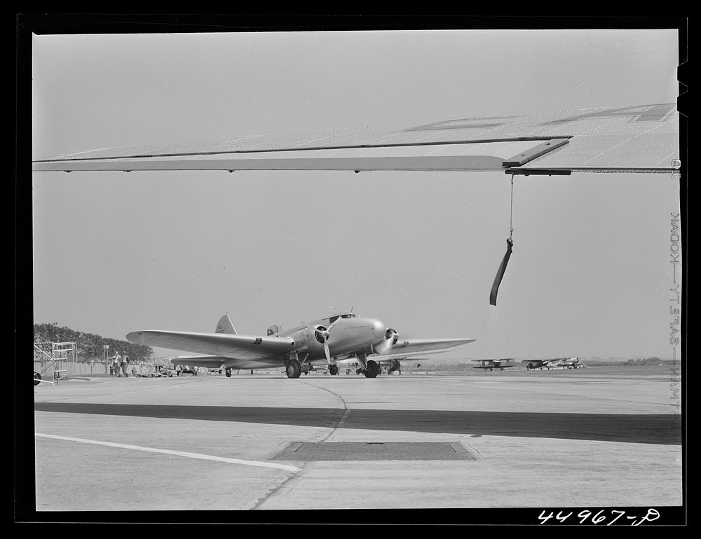 A non-commercial plane comes into the airport. Municipal airport, Washington, D.C.. Sourced from the Library of Congress.