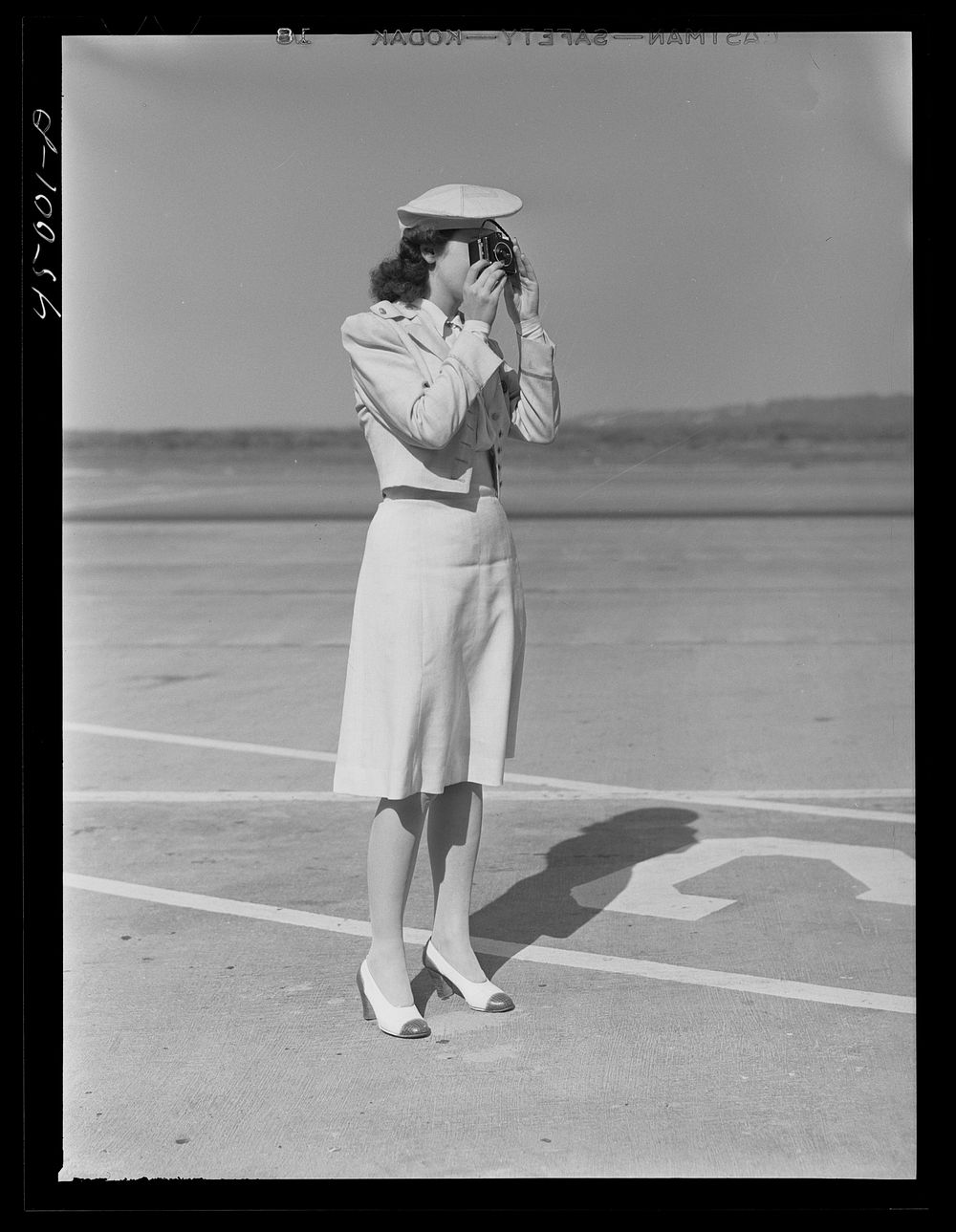 An airline hostess. Washington, D.C. municipal airport. Sourced from the Library of Congress.
