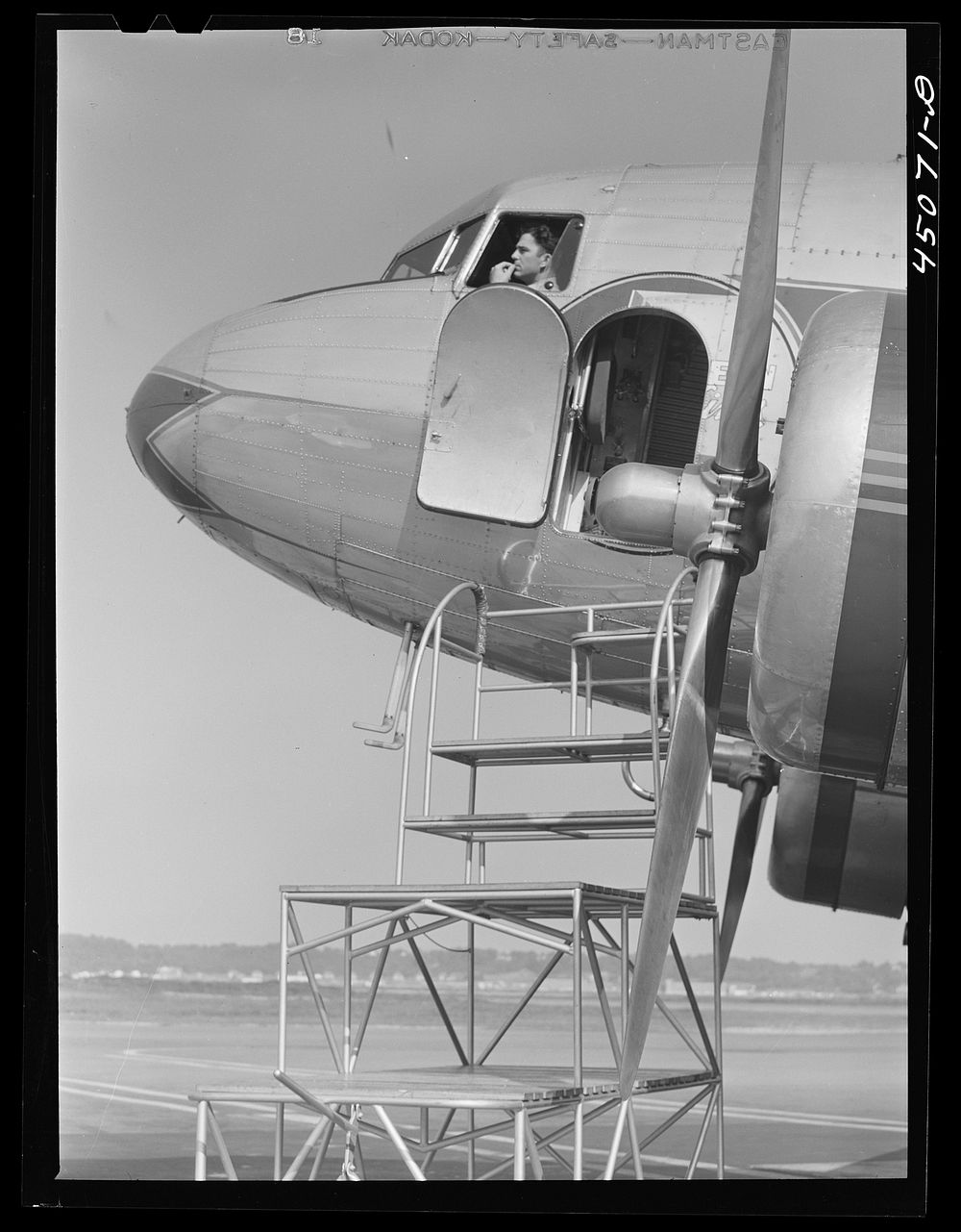 The captain is in his place and in a few minutes the plane will take-off. Municipal airport, Washington, D.C.. Sourced from…