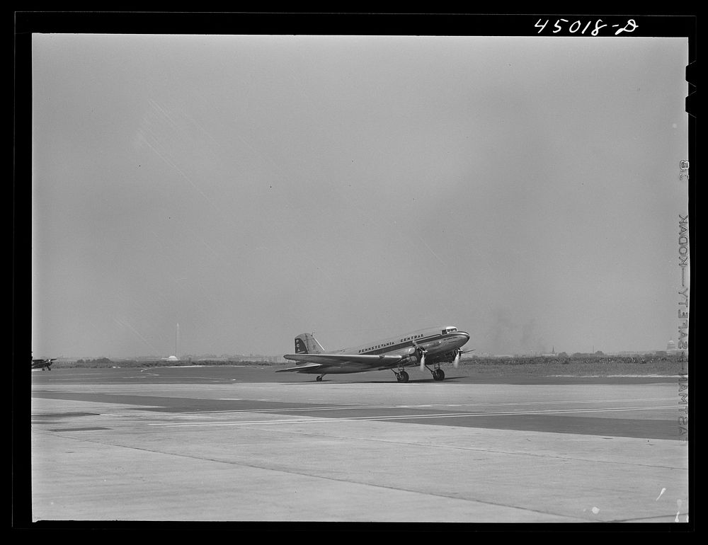 An airliner taxiing down the field. Washington.,D.C. municipal airport. Sourced from the Library of Congress.