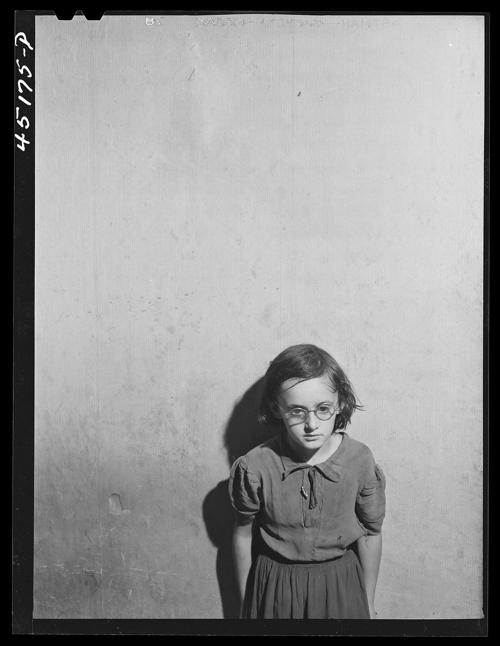 One of the children of Albert Lynch, FSA (Farm Security Administration) dairy farmer near Dummerston, Vermont. Sourced from…