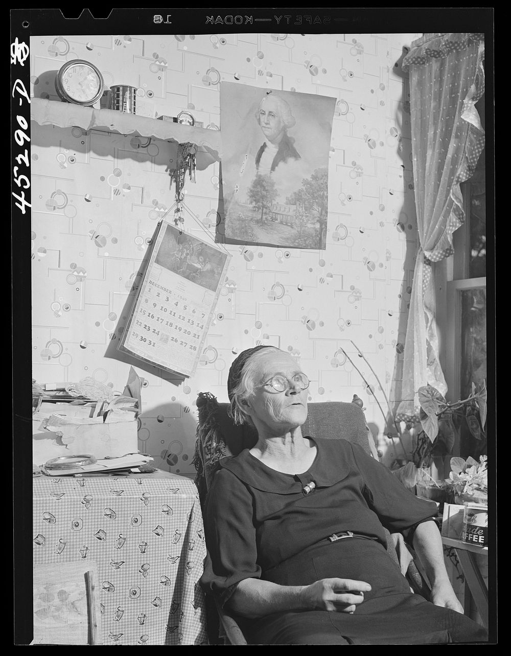 Mrs. Myrtle Higgins of Leraysville, New York, with some of the belongings she has packed preparing to move out of the area…
