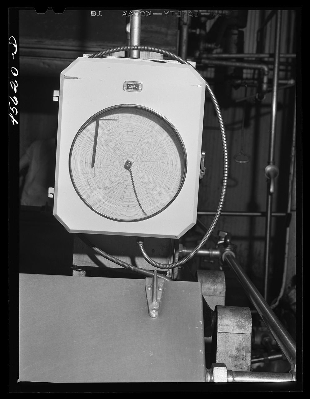 Thermostat recording temperature in the pasteurizing unit at the Burlington cooperative milk bottling plant. Burlington…